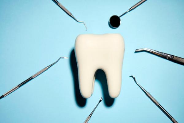 A tooth surrounded by dental equipment